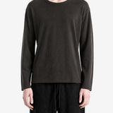 Black t-shirt worn by a person, showing the t-shirt fit