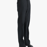 Black pants worn by a person, showing the pants fit