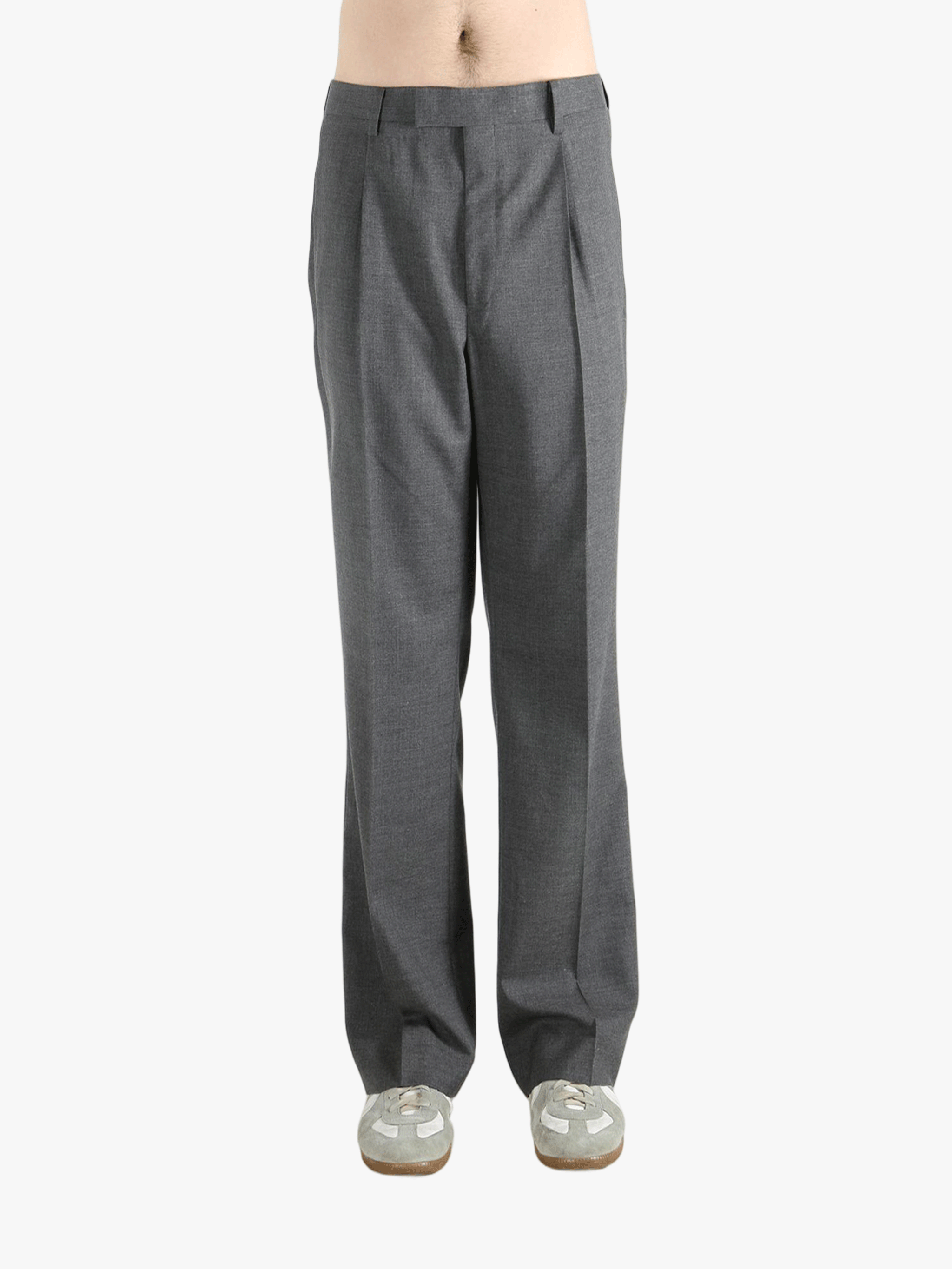 Grey pants worn by a person, showing the pants' fit