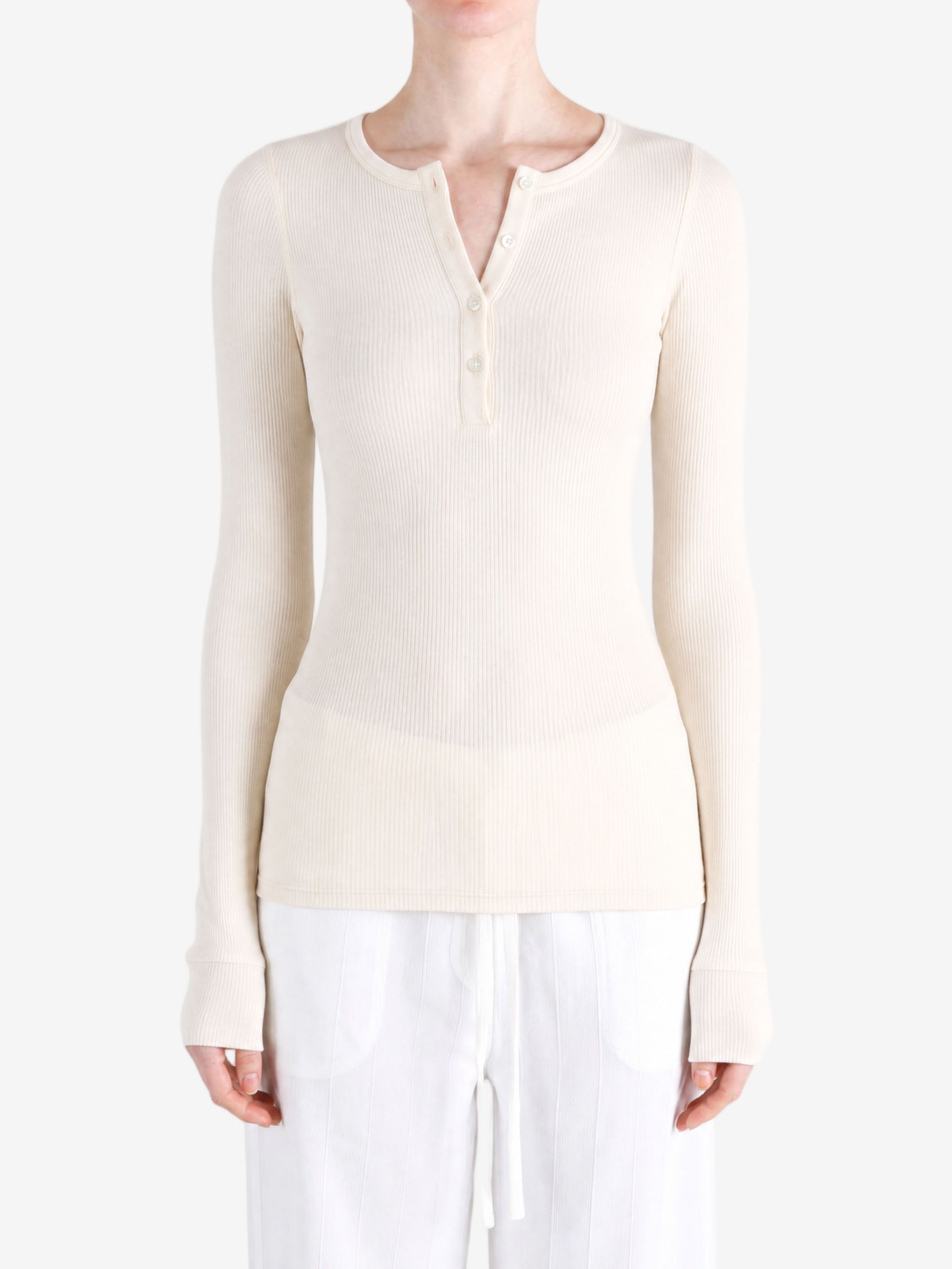 Tan top worn by a person, showing the top fit