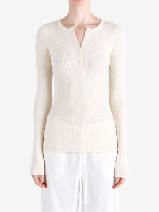 Tan top worn by a person, showing the top fit