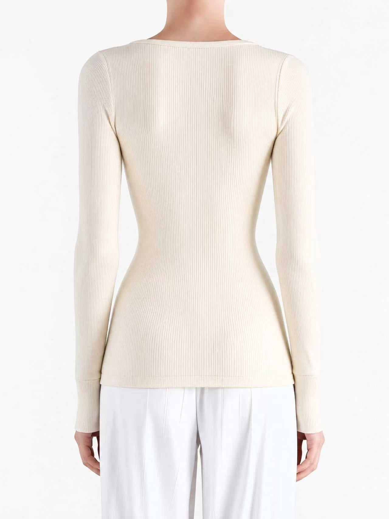 Tan top worn by a person, back view