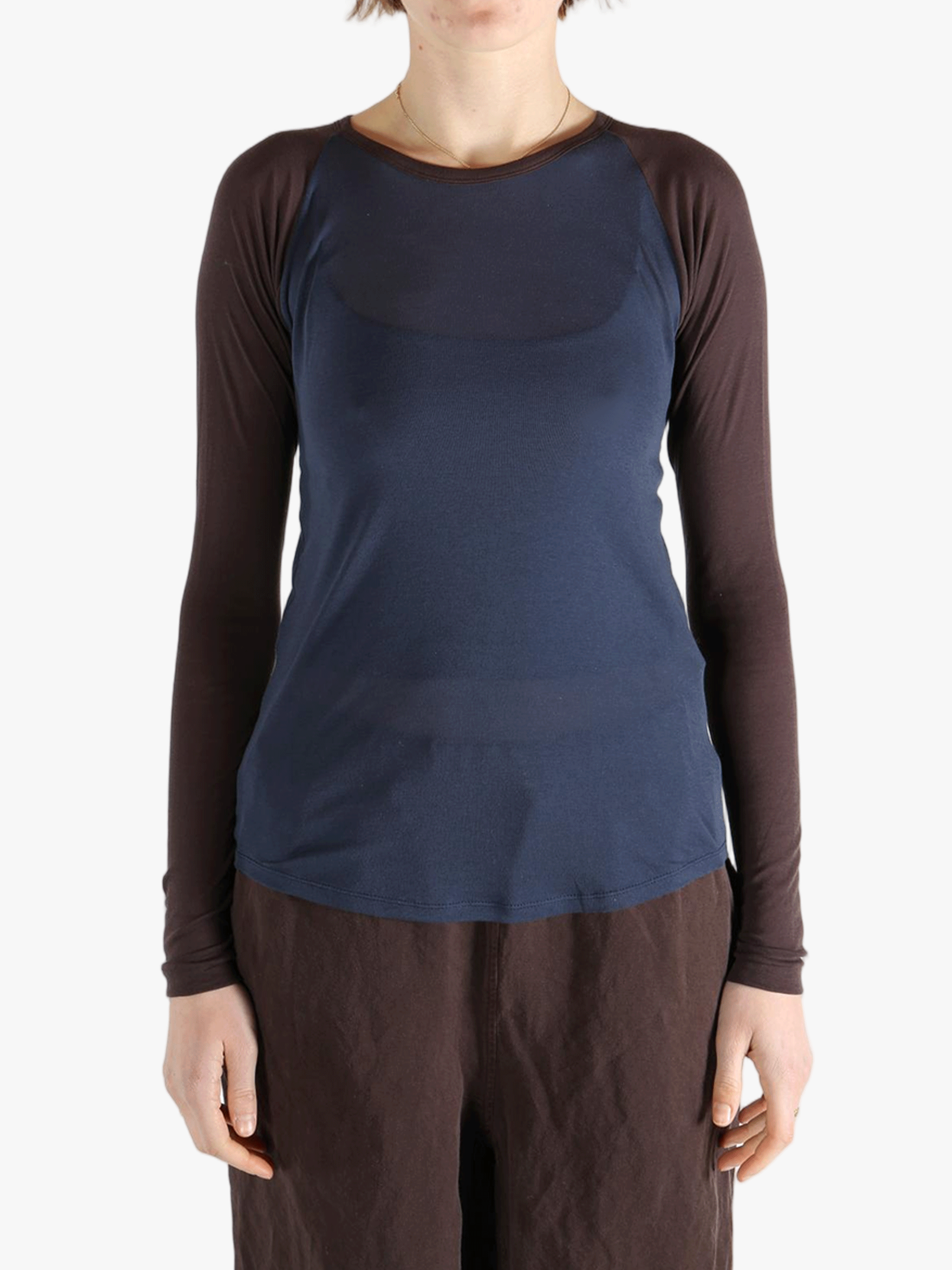 Navy top worn by a person, showing the top's fit