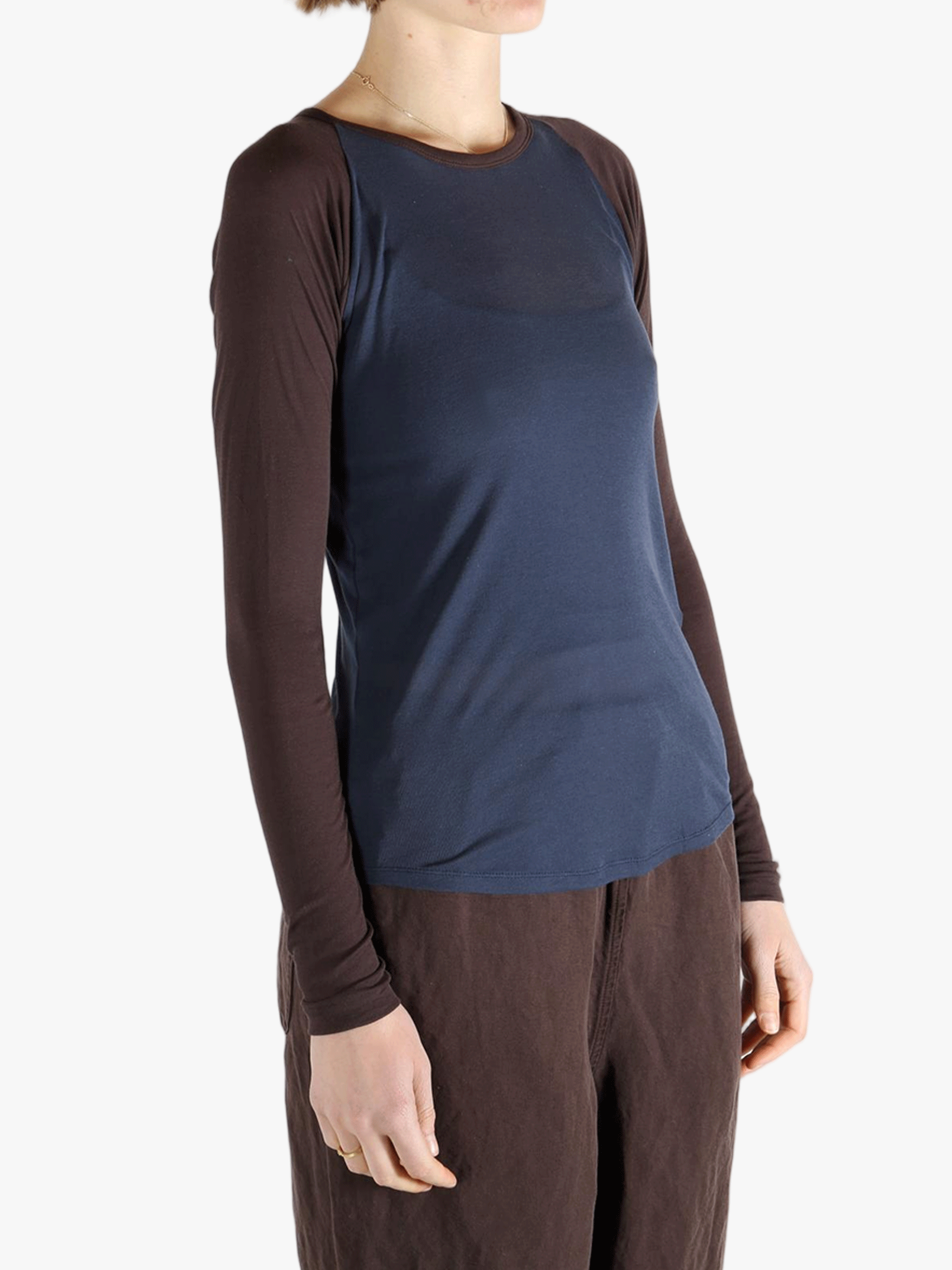 Navy top worn by a person, showing the top's fit