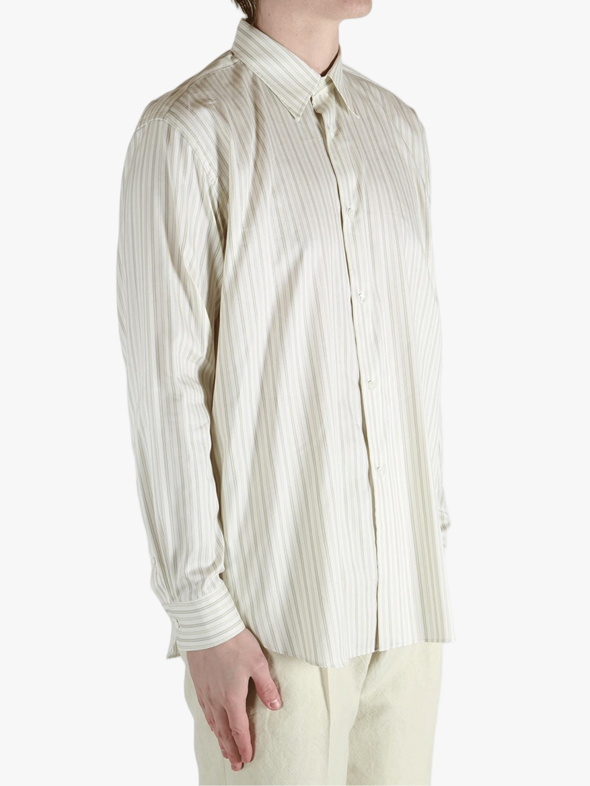 White shirt worn by a person, showing the shirt's fit