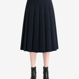 Navy skirts worn a person,showing the skirts fit