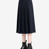Navy skirts worn a person,showing the skirts fit