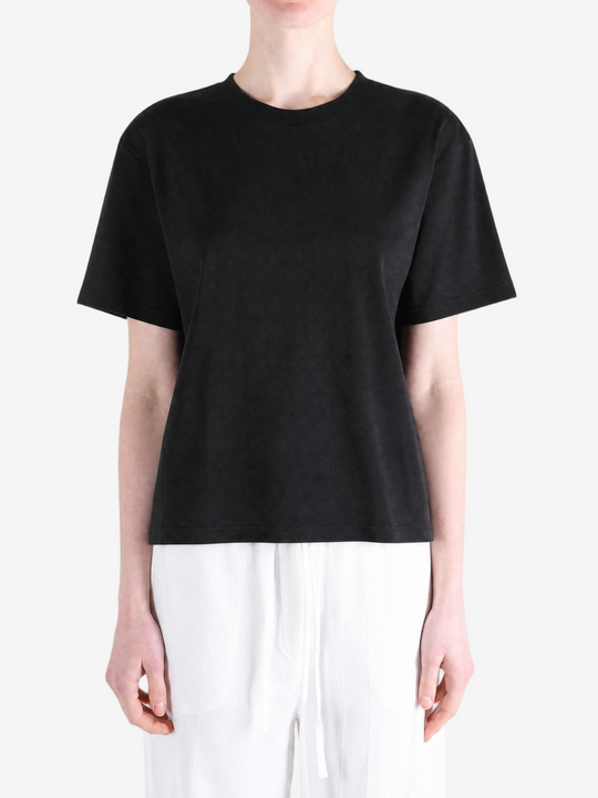 Black t-shirt worn by a person, showing the t-shirt's fit