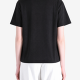 Black t-shirt worn by a person, showing the t-shirt's fit