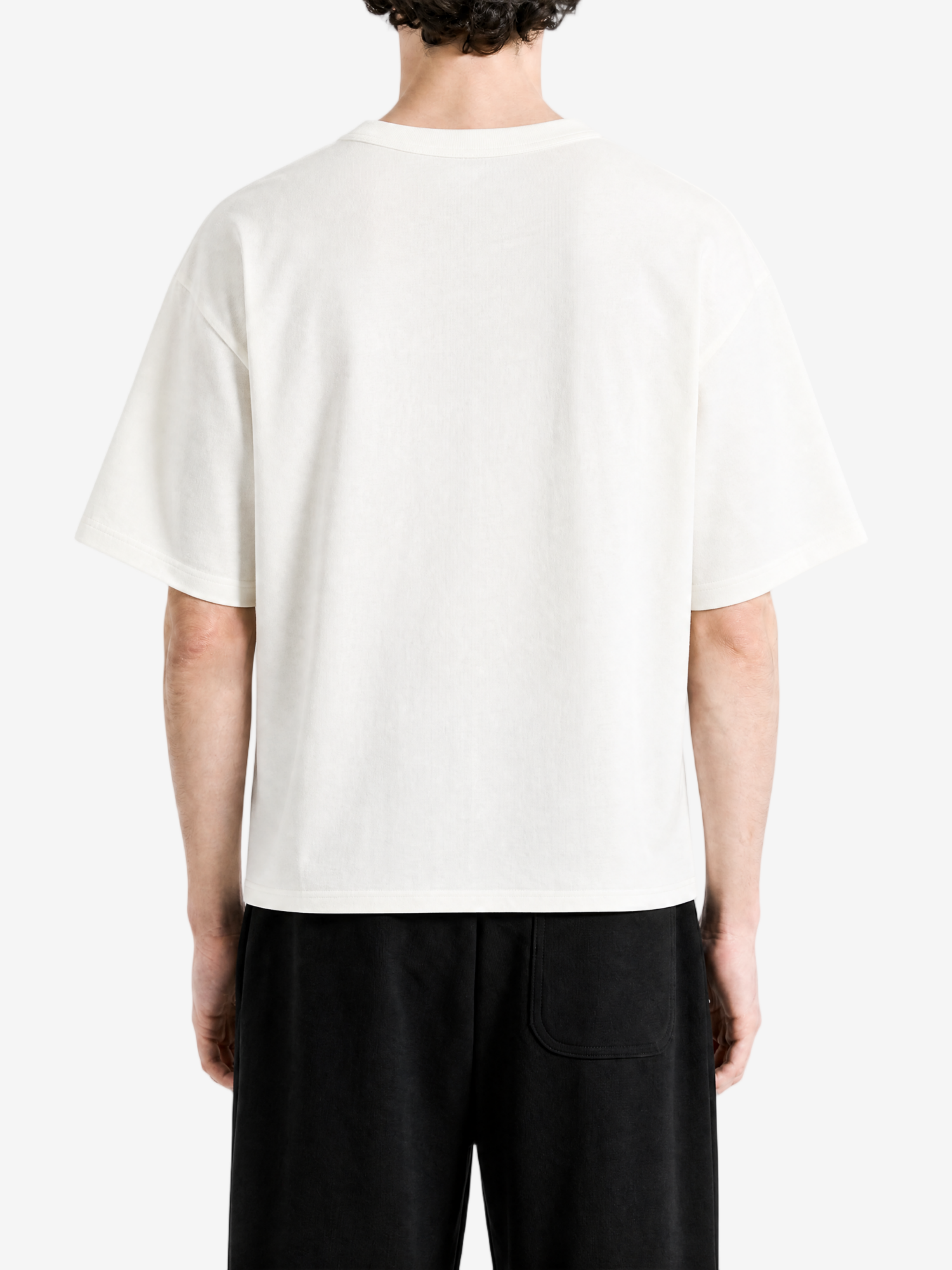 White t-shirt worn by a person, back view