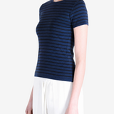 Blue t-shirt worn by a person, showing the t-shirt's fit