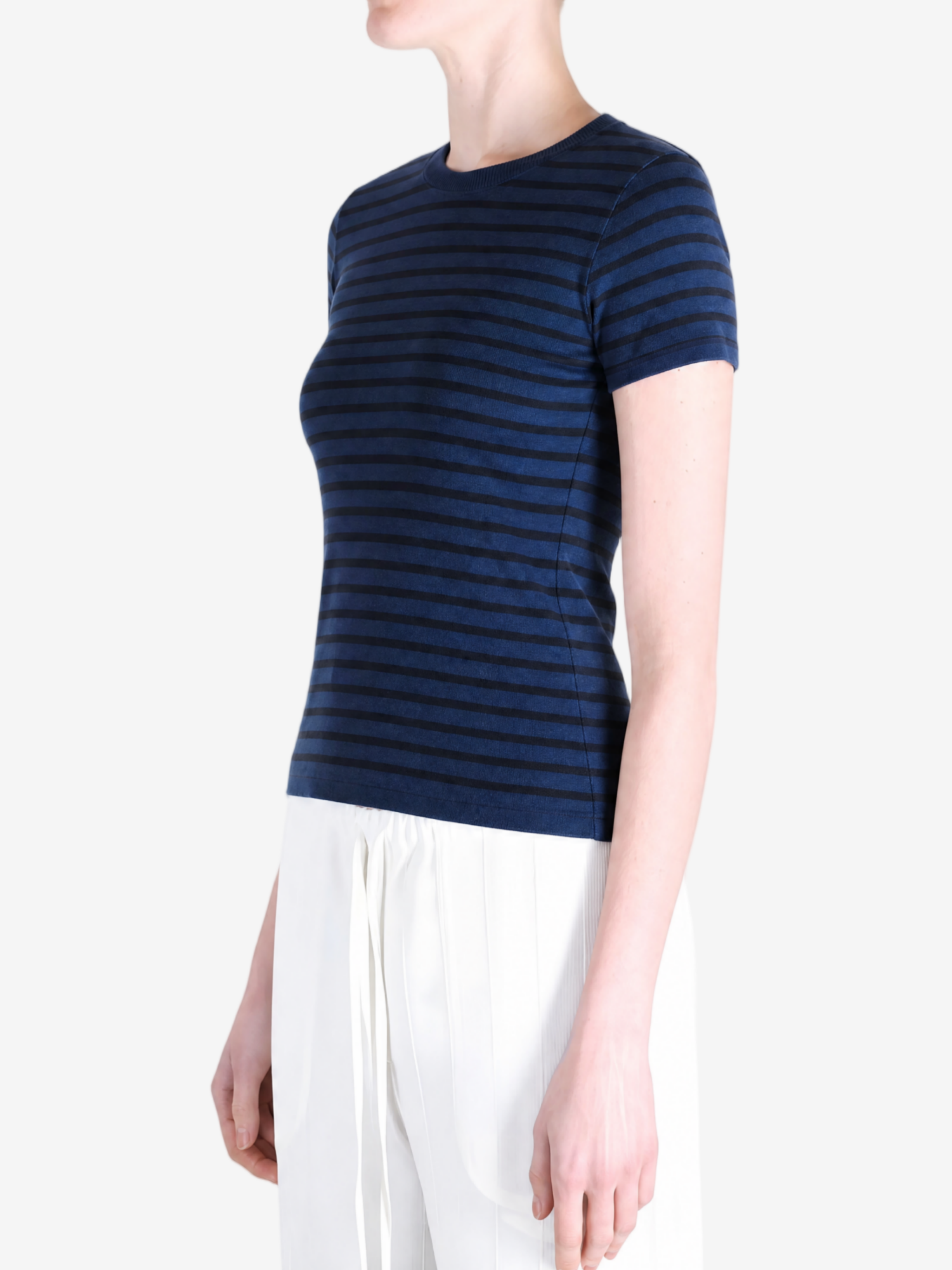 Blue t-shirt worn by a person, showing the t-shirt's fit