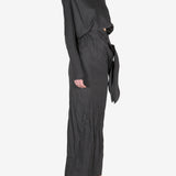 Black dress worn by a person, showing the dress's fit