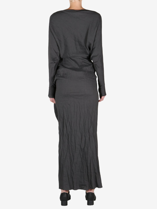 Black dress worn by a person, showing the dress's fit