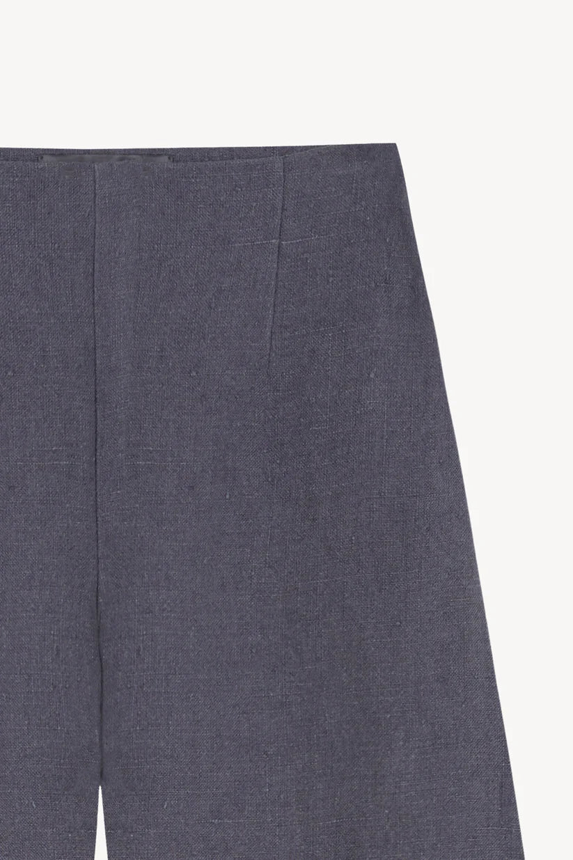 Close up of blue pant, showing texture of the Linen fabric