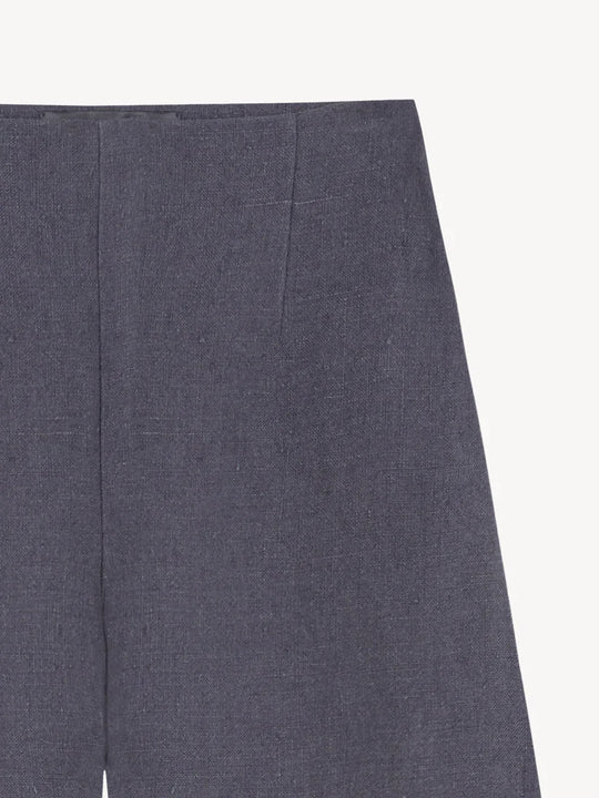 Close up of blue pant, showing texture of the Linen fabric