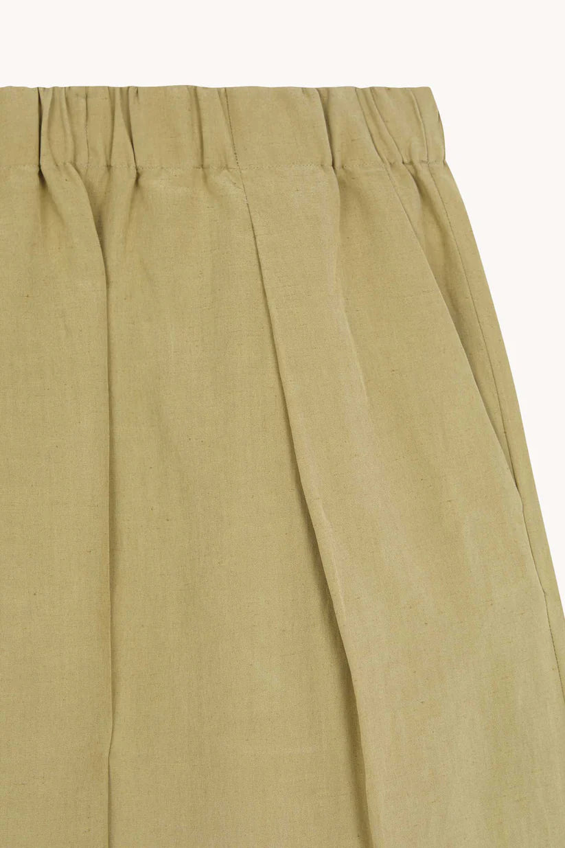 Close up of brown pant, showing texture of the Linen and Silk fabric