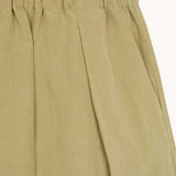 Close up of brown pant, showing texture of the Linen and Silk fabric