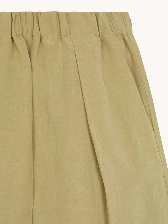 Close up of brown pant, showing texture of the Linen and Silk fabric