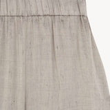 Close up of grey pant, showing texture of the Linen and Viscose fabric