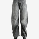 Gray pants worn by a person, showing the pants' fit