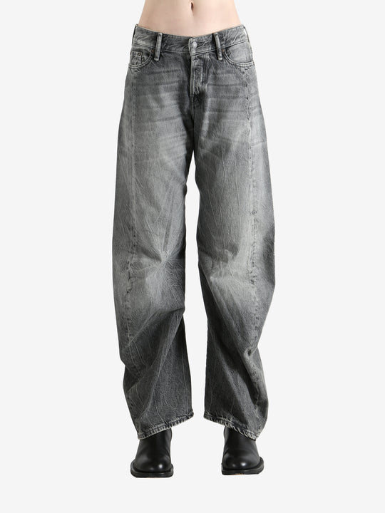 Gray pants worn by a person, showing the pants' fit