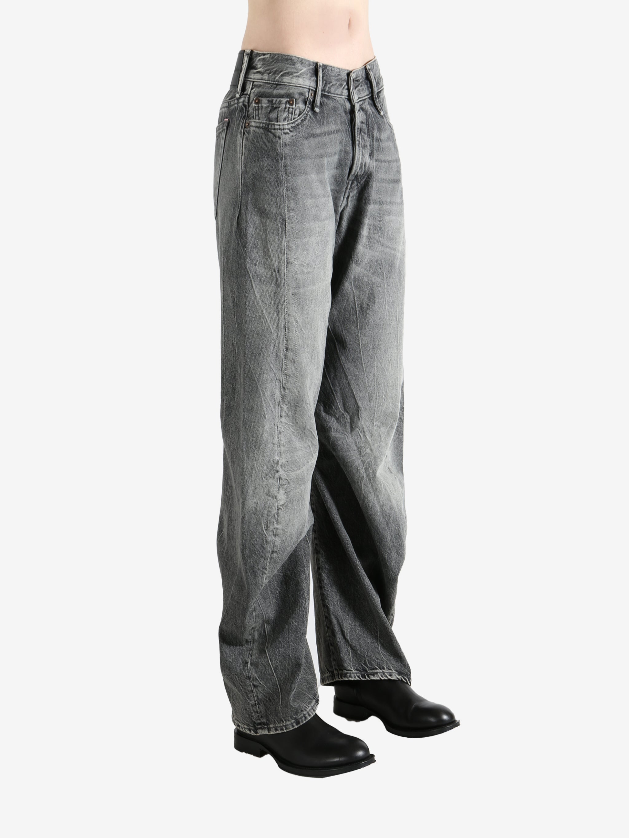 Gray pants worn by a person, showing the pants' fit