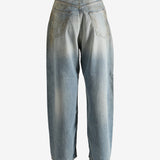 Blue pants worn by a person, showing the pants' fit