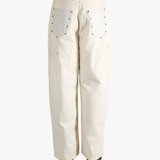 White pants, back view