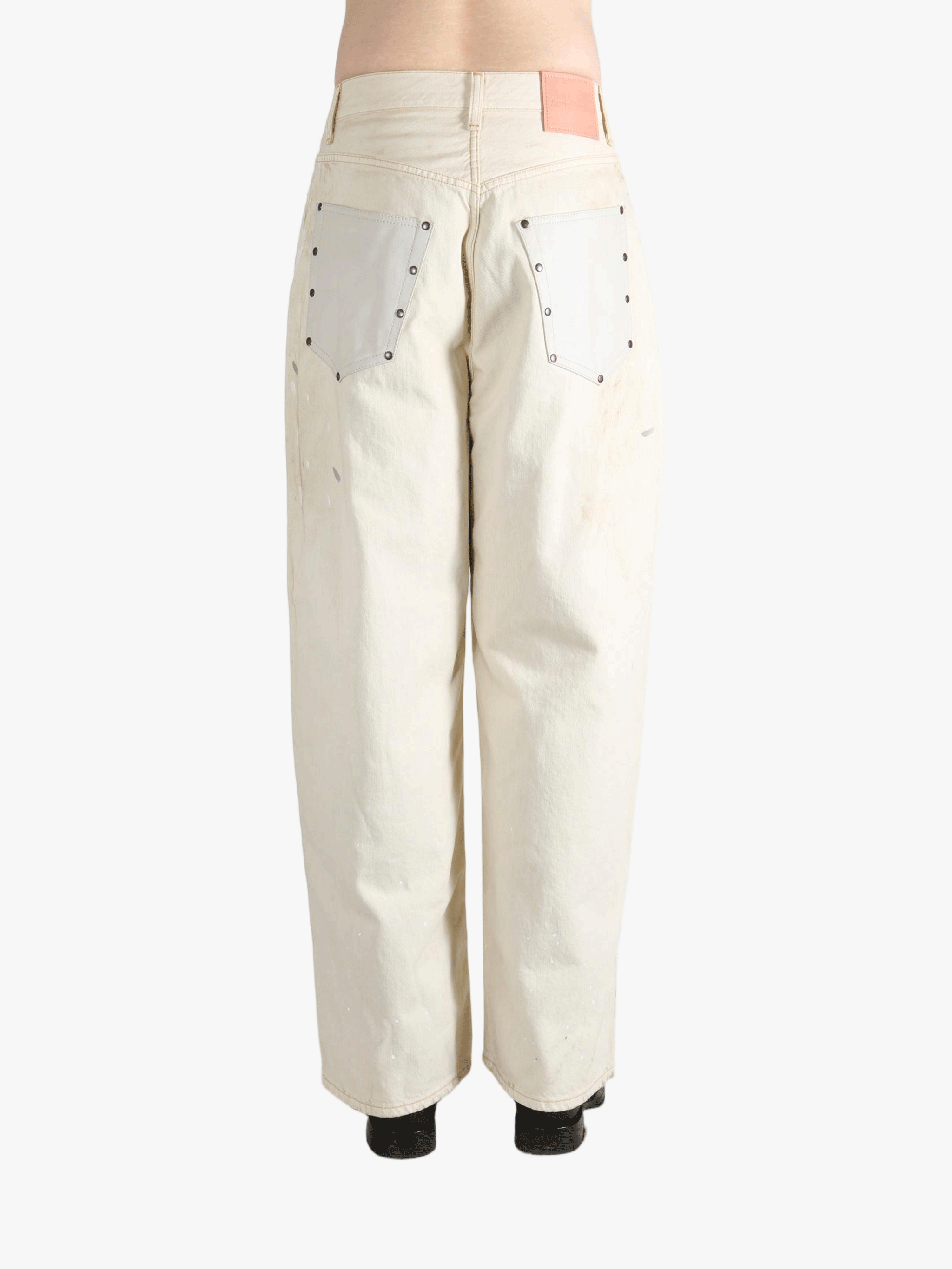 White pants, back view