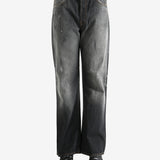 Black pant worn by a person, showing the pant's fit