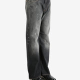 Black pant worn by a person, showing the pant's fit