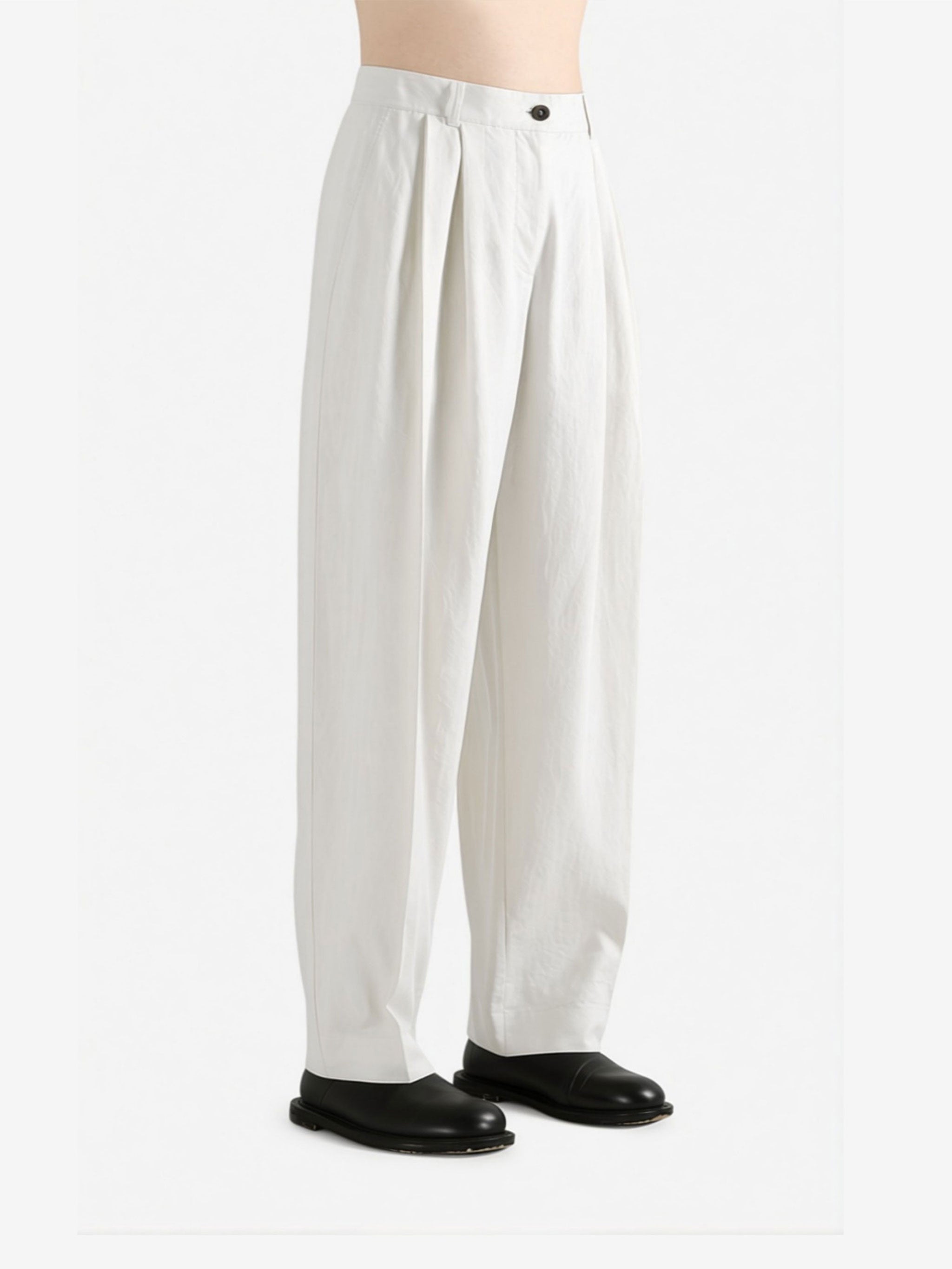 White pants worn by a person, side view