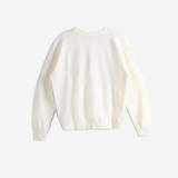 White knitwear, back view