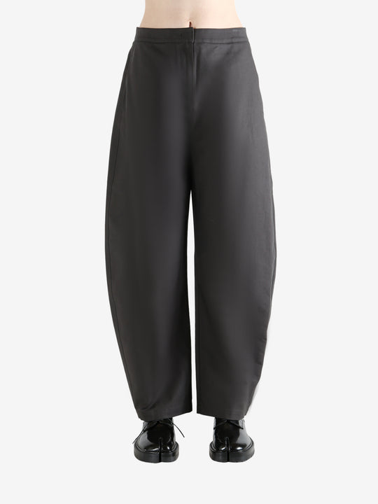 Grey pants  worn by a person, showing the pants fit