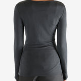 Grey shirts worn by a person, showing the shirts fit