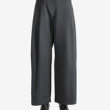 Grey pants worn by a person, showing the pants fit