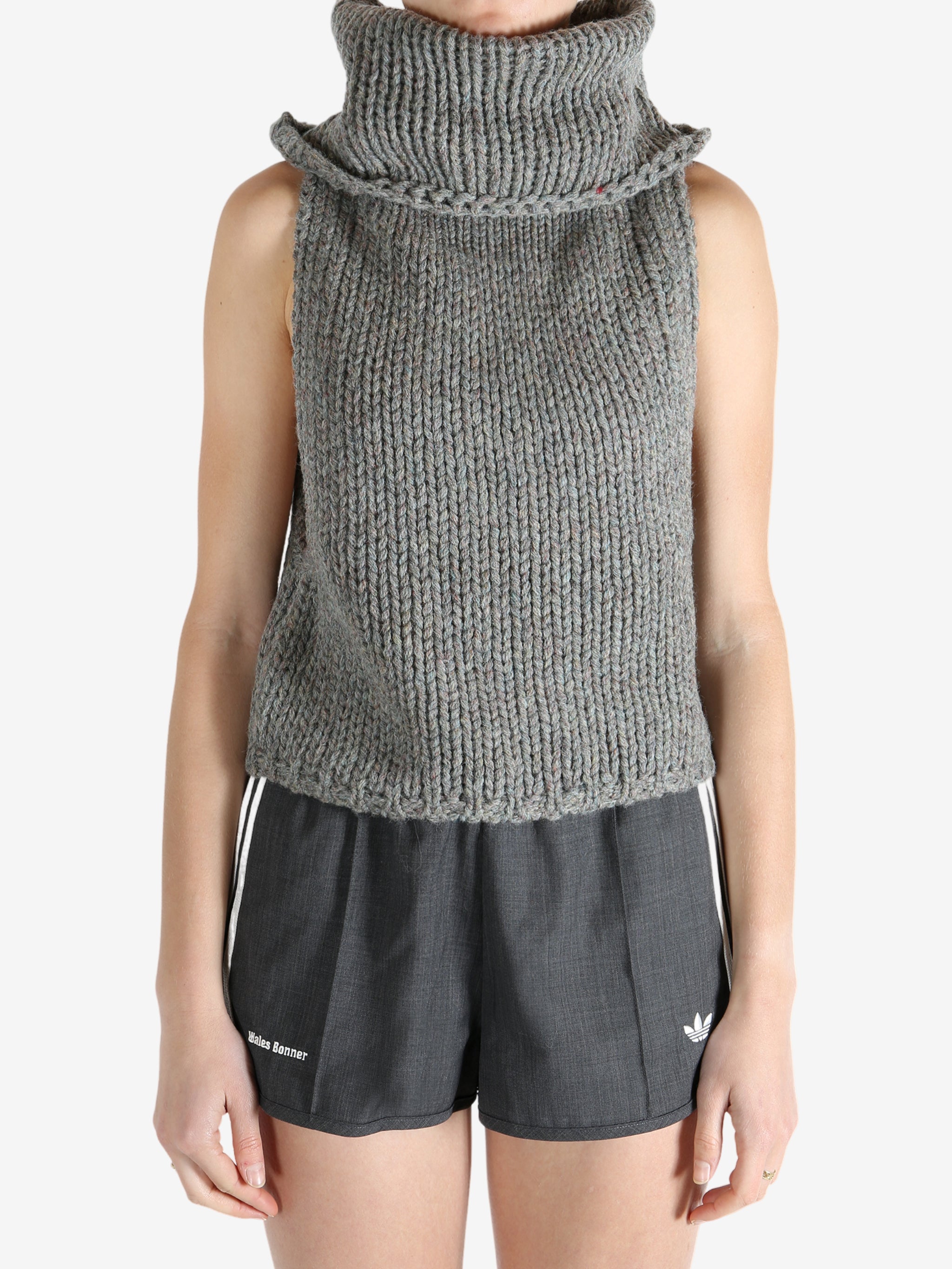 Grey vest worn by a person, showing the vest fit