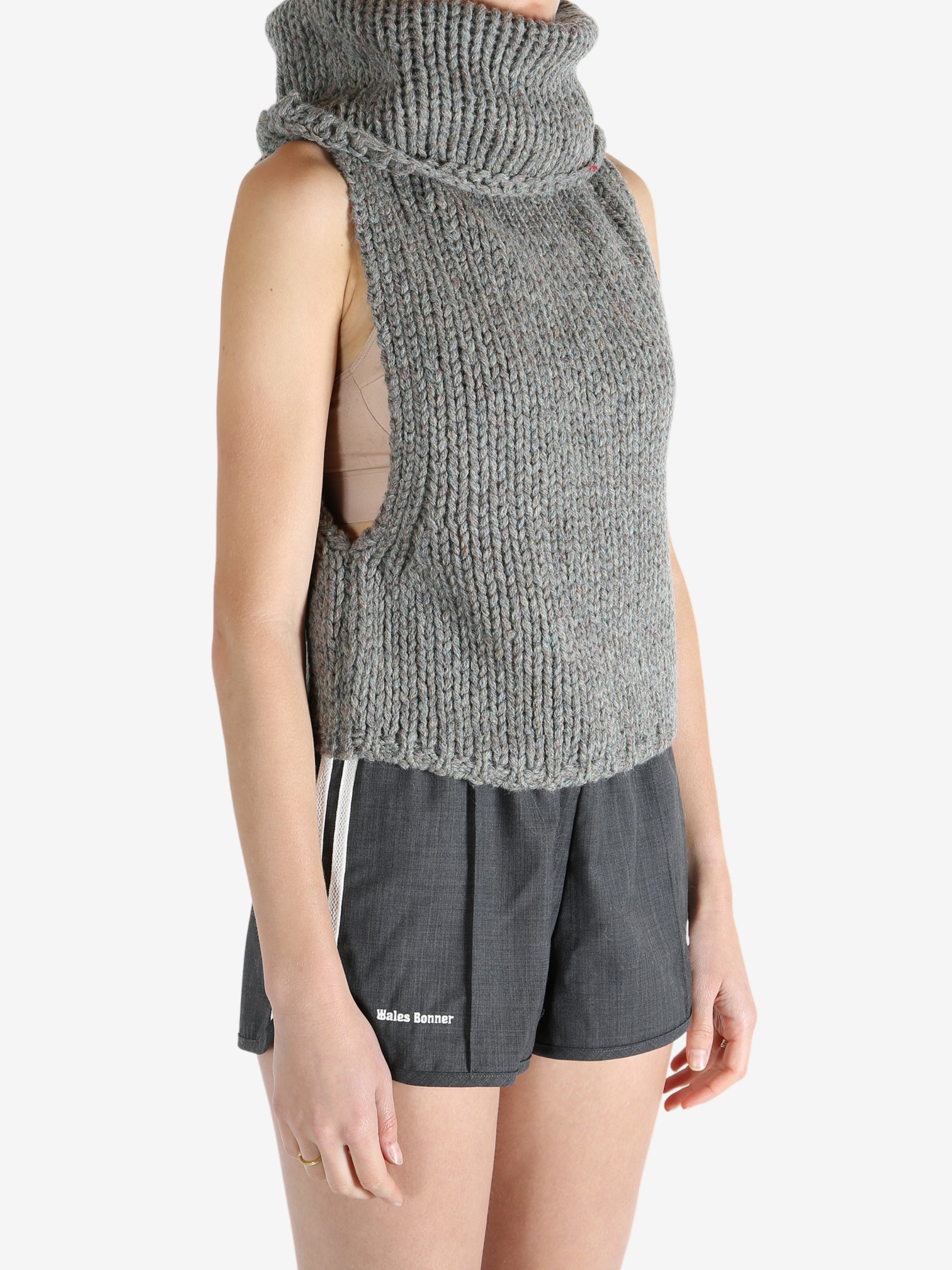 Grey vest worn by a person, showing the vest fit