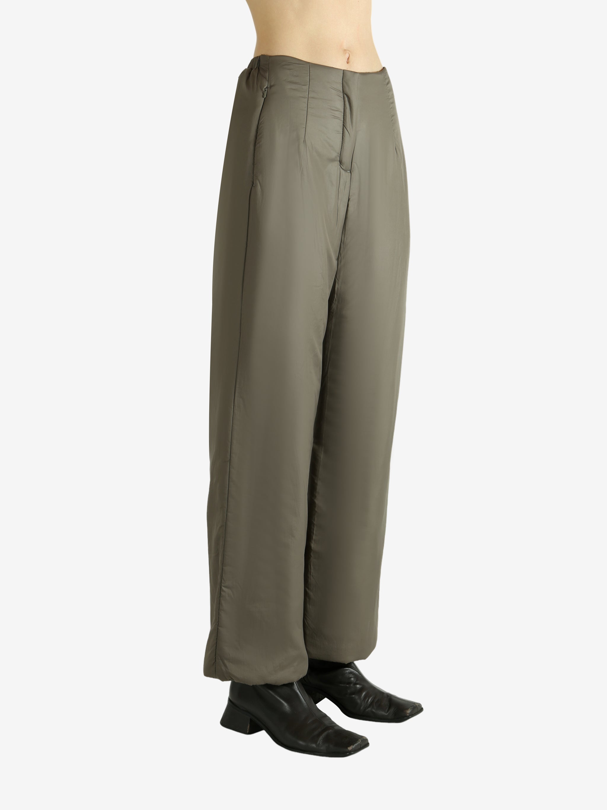 Tan pants worn by a person, showing the pants fit
