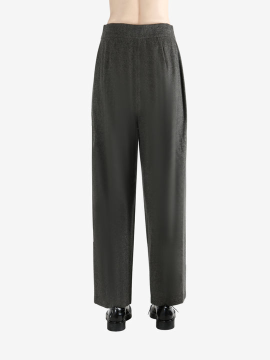 Grey pants worn by a person, showing the pants fit