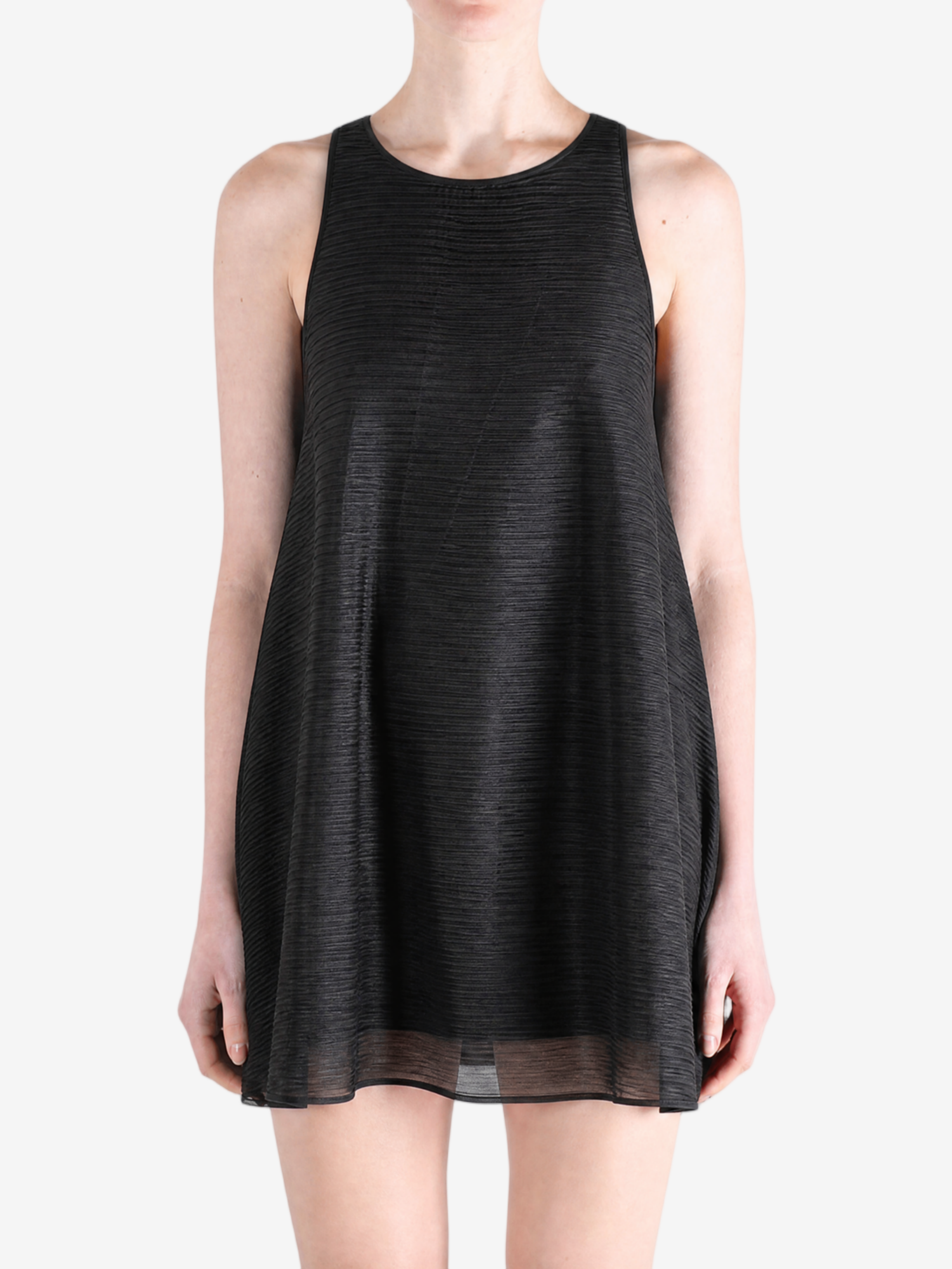 Black dress worn by a person, showing the dress fit