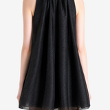 Black dress worn by a person, back view