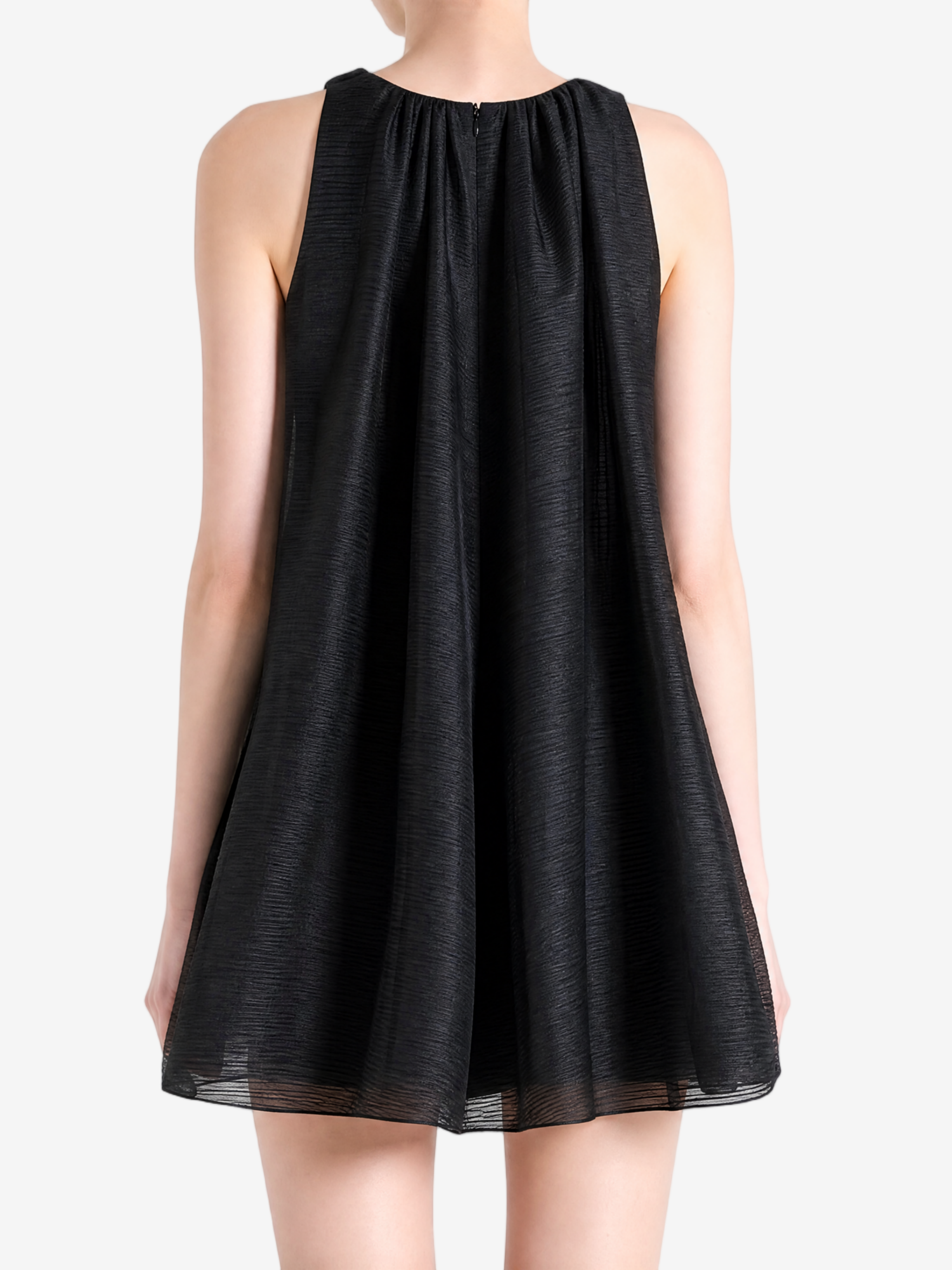 Black dress worn by a person, back view
