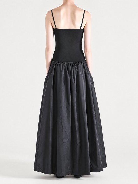 Black dress worn by a person, back view