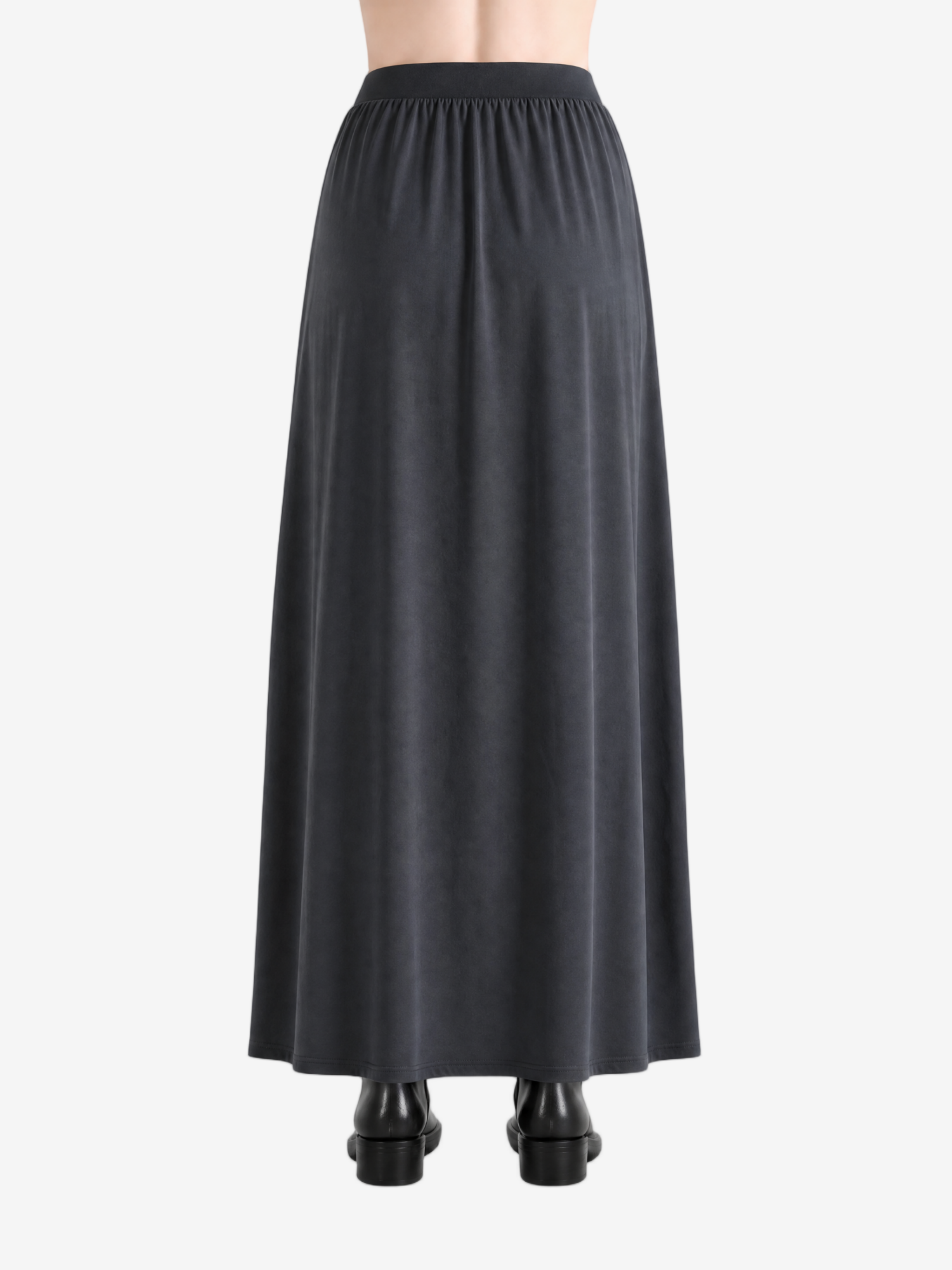 Black skirts worn by a person, showing the skirts fit