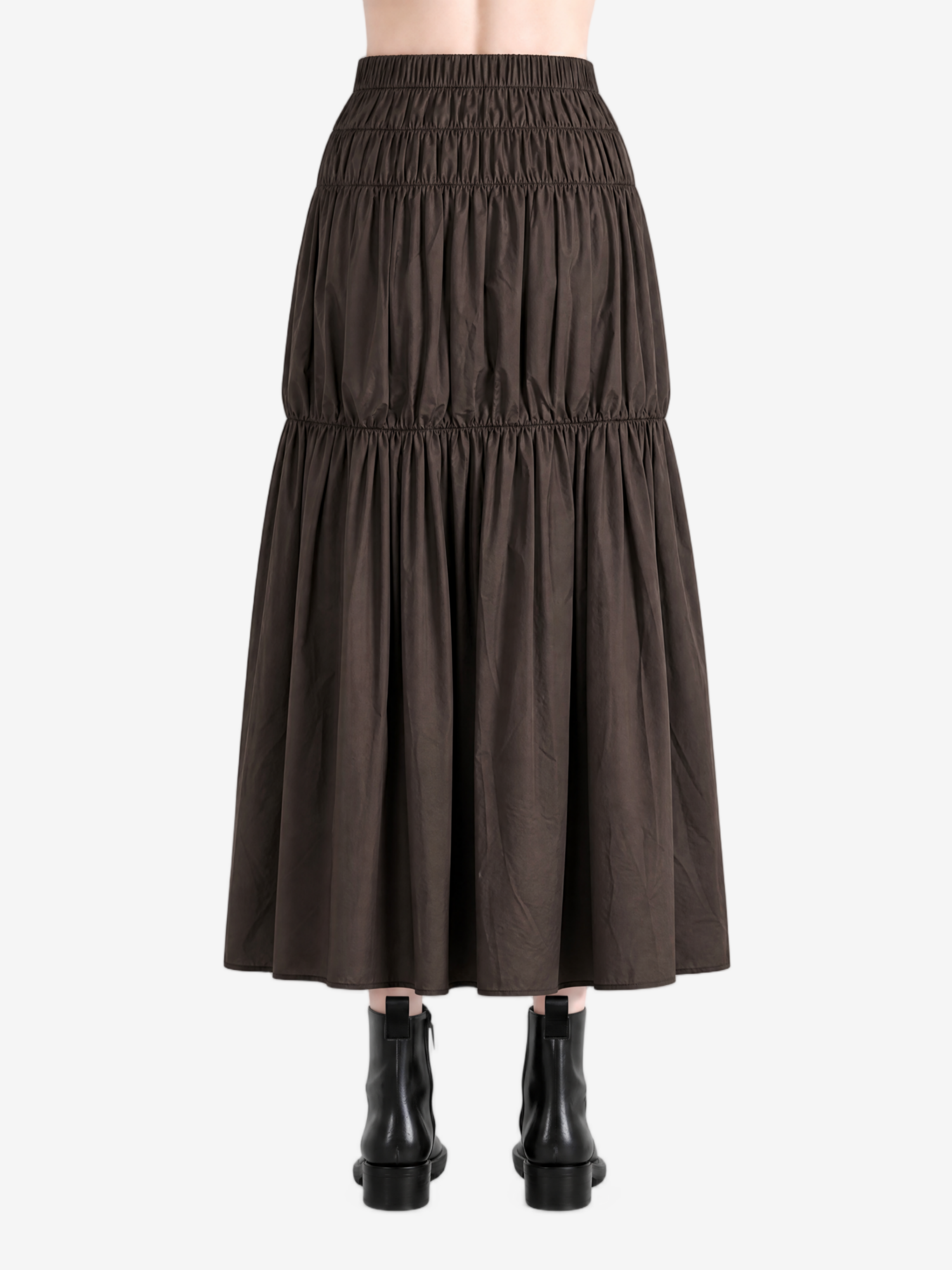 Brown skirt worn by a person, showing the skirt fit