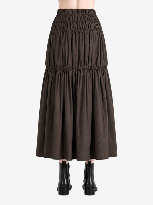 Brown skirt worn by a person, showing the skirt fit