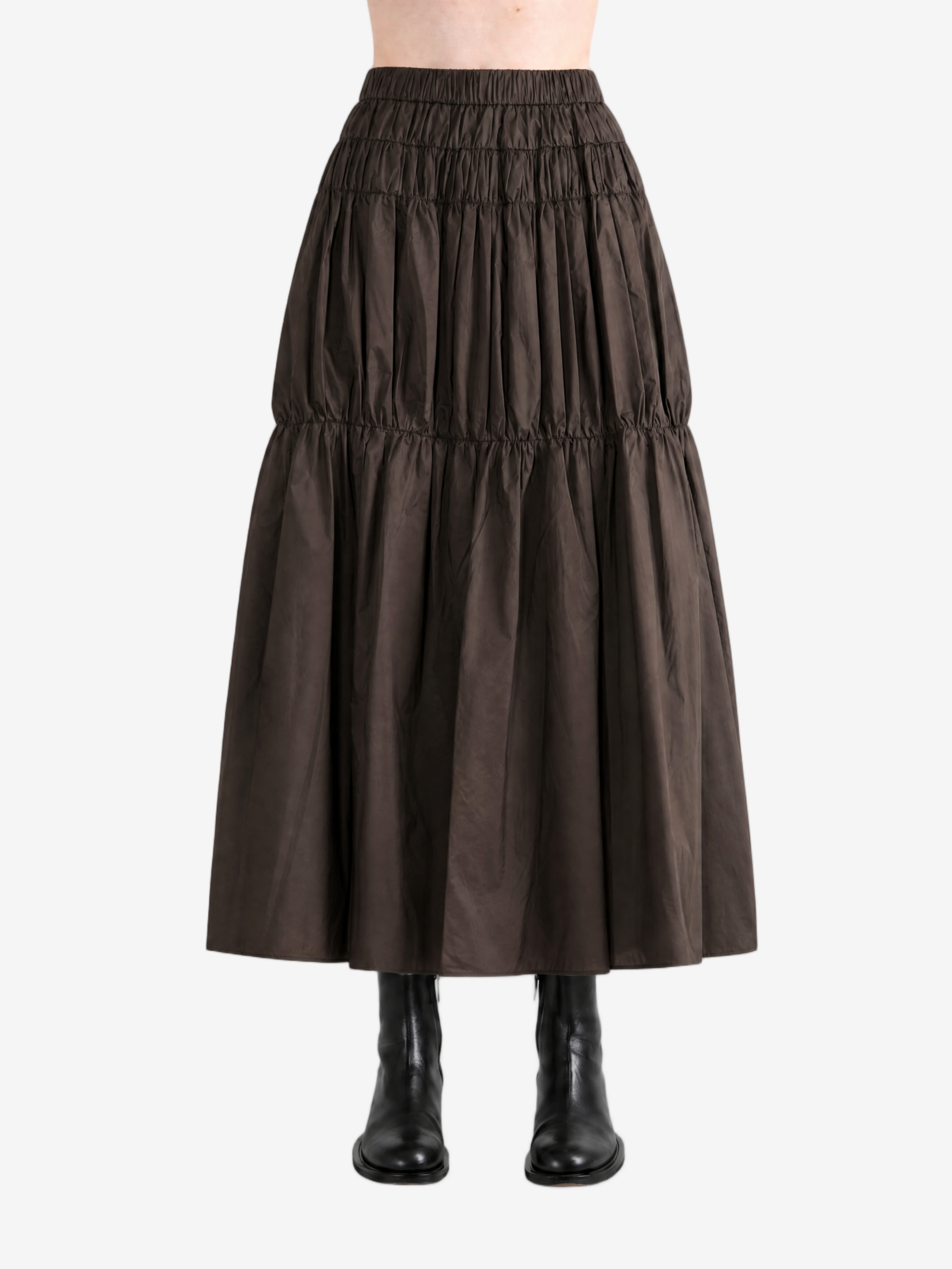 Brown skirt worn by a person, back view