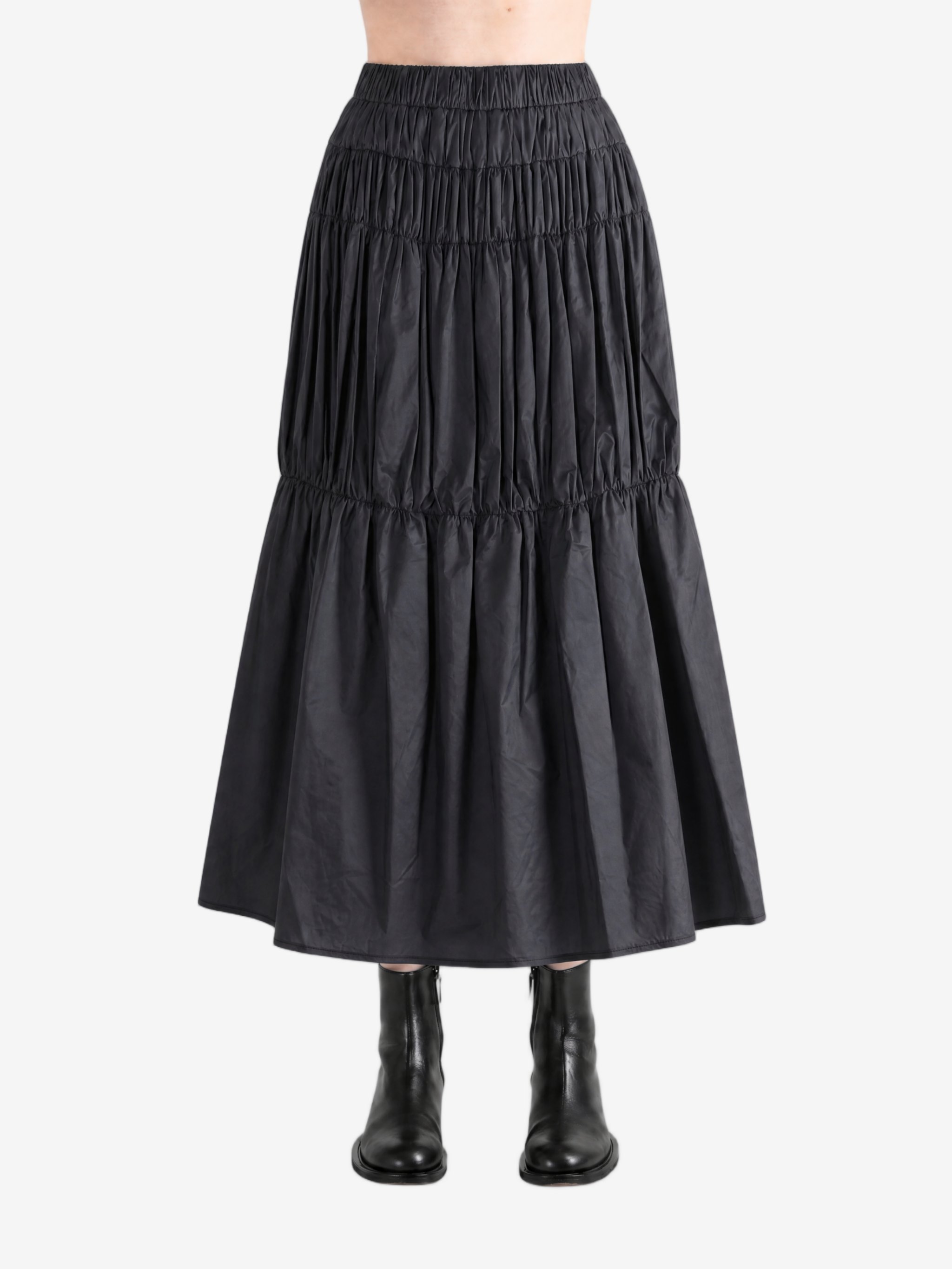 Black skirt worn by a person, showing the skirt fit